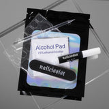 Complimentary nail file, alcohol swap, sticky tabs, cuticle pusher and nail glue kit