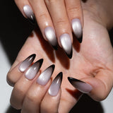 Close-up of hands with gradient nail art on a neutral background